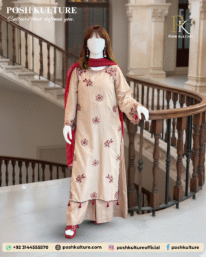 Mannequin wearing a beige three-piece Dhanak suit with maroon floral embroidery on the shirt and matching embroidered shawl.